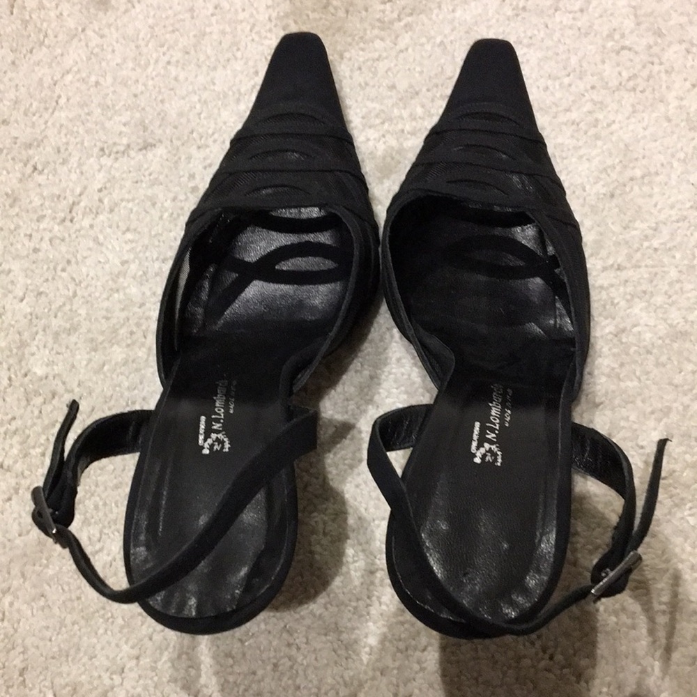 Black low heel sling back sandal.